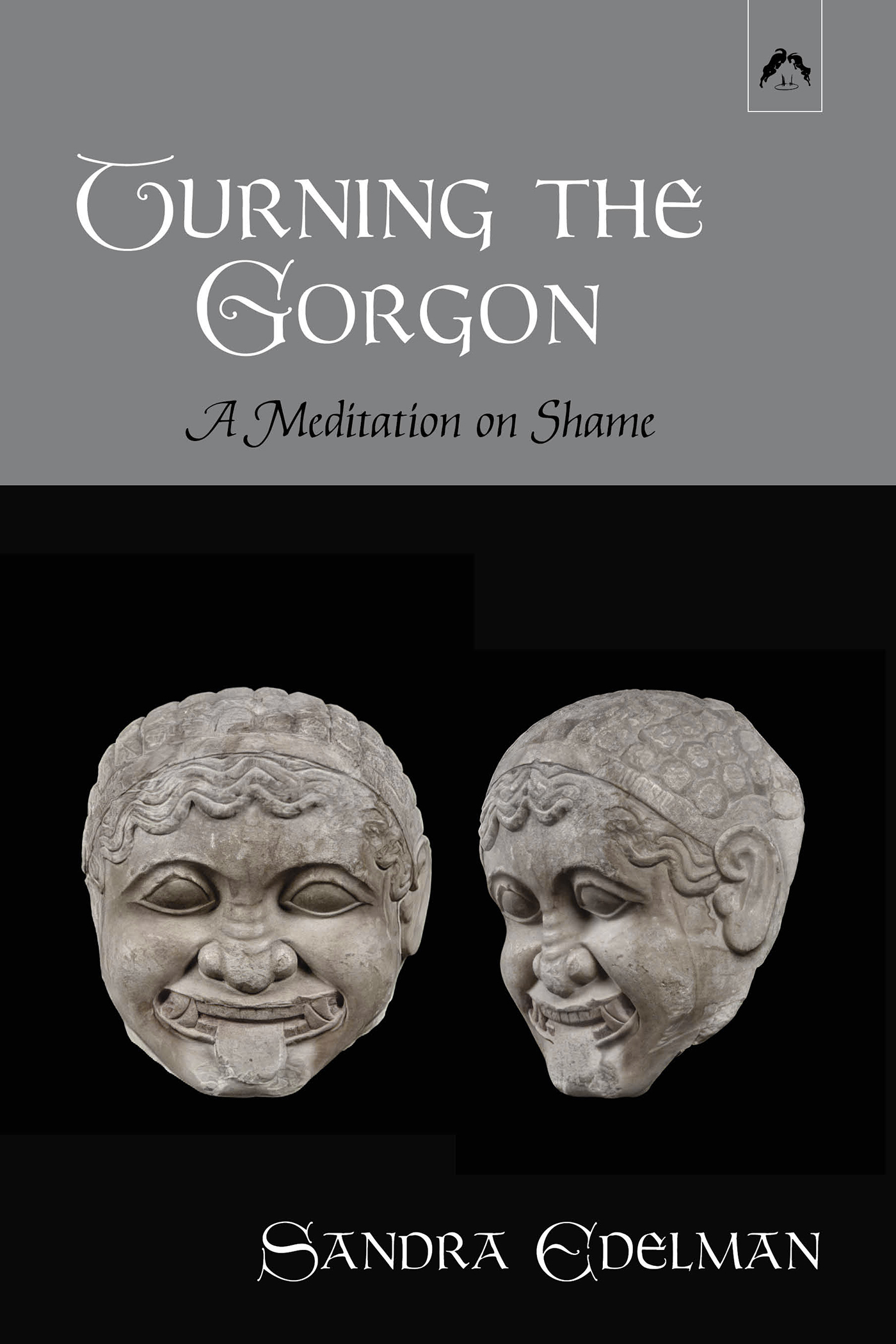 two views of an ancient Gorgon head